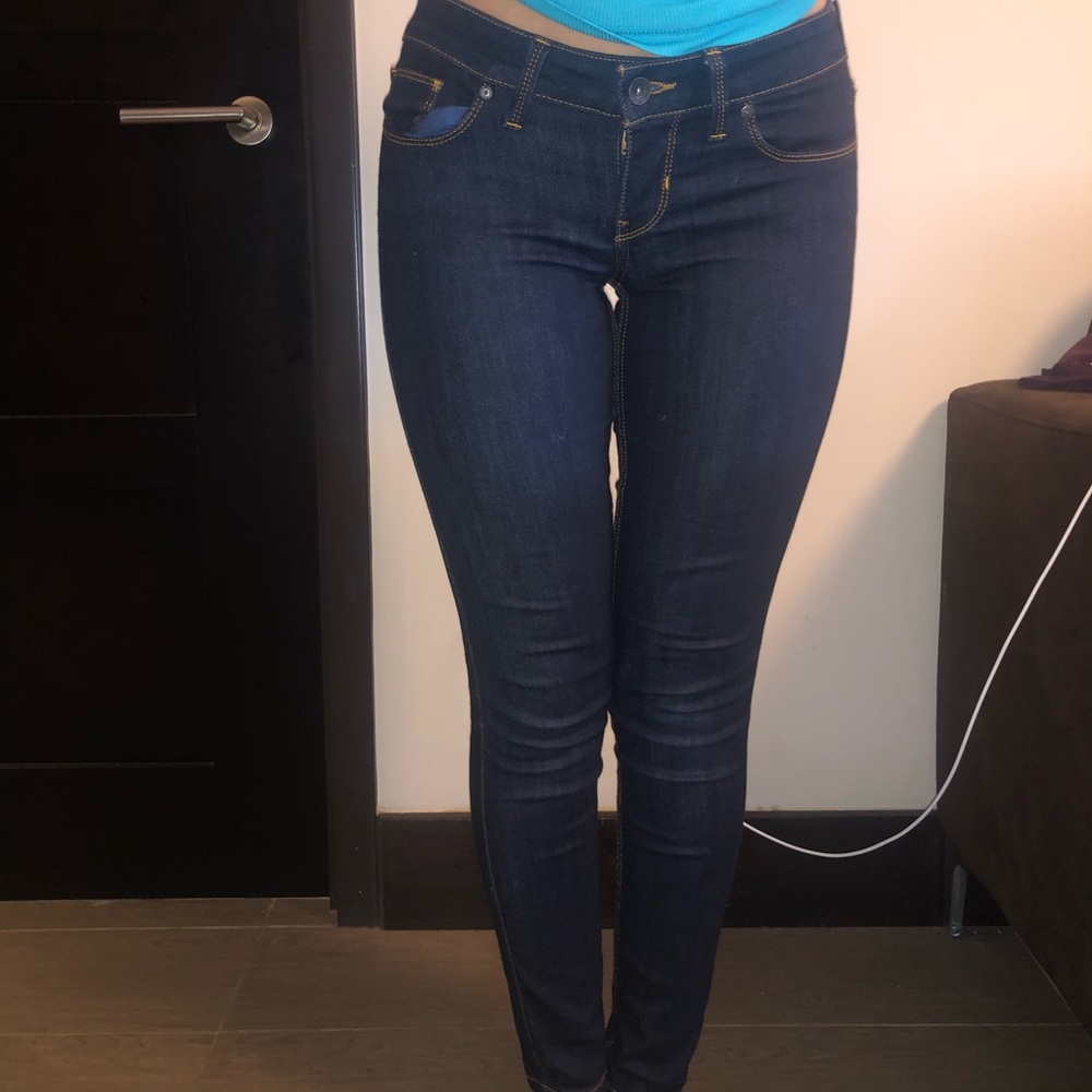 Guess low rise dark blue Jeans.